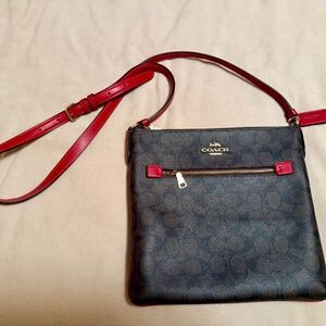 Retired Vintage Coach Rowan File Bag featuring signature coated canvas